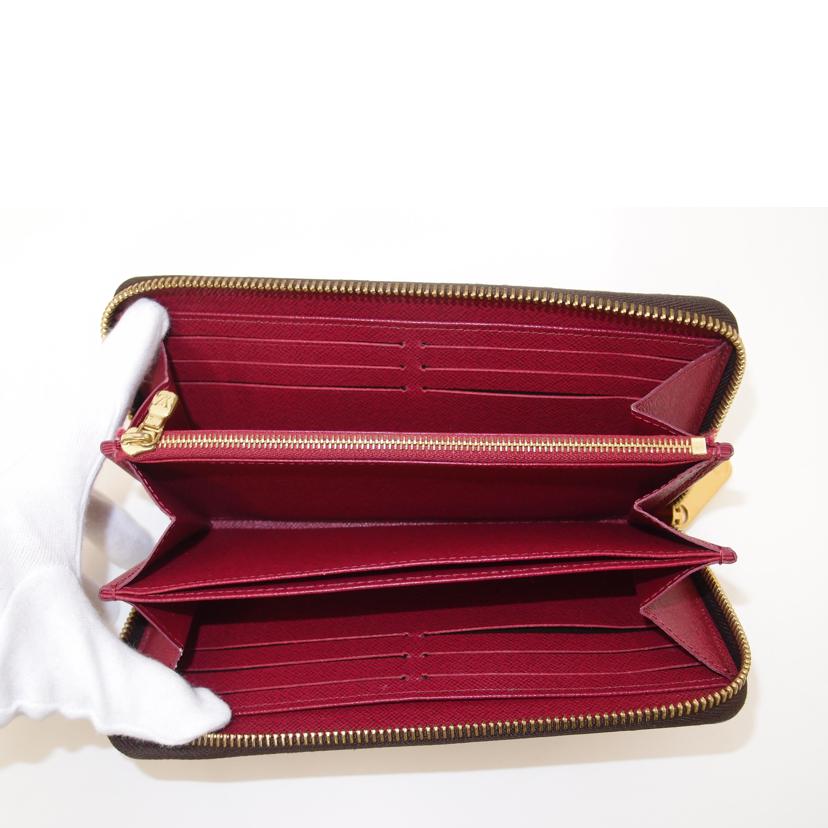 LOUIS VUITTON ルイヴィトン/ジッピーウォレット/モノグラム/フューシャ/M41895//RFI****/ABランク/69