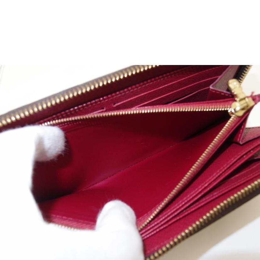 LOUIS VUITTON ルイヴィトン/ジッピーウォレット/モノグラム/フューシャ/M41895//RFI****/ABランク/69