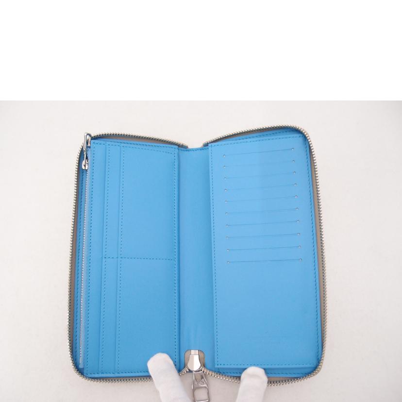 LOUIS VUITTON ルイヴィトン 2022年秋冬コレクション ラウンドファスナー長財布 チョークホワイト モノグラムエンボス レディース メンズ/ジッピーウォレット・ヴェルティカル/トリヨンクライミング/M81573//RFI****/Aランク/69