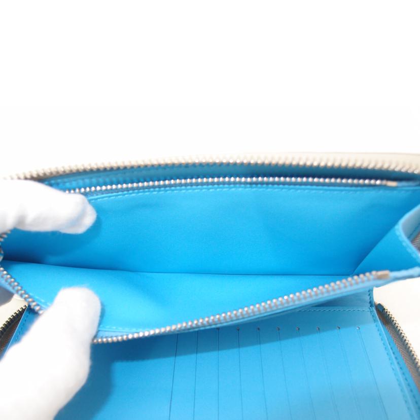 LOUIS VUITTON ルイヴィトン 2022年秋冬コレクション ラウンドファスナー長財布 チョークホワイト モノグラムエンボス レディース メンズ/ジッピーウォレット・ヴェルティカル/トリヨンクライミング/M81573//RFI****/Aランク/69