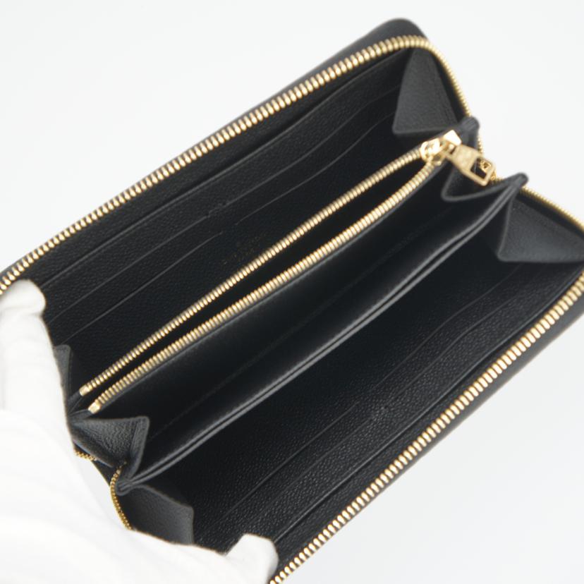 LV ルイヴィトン LOUISVUITTON モノグラムアンプラント ジッピーウォレット ラウンド長財布 レディース/モノグラムアンプラント/ジッピーウォレット/M61864//SP5***/Aランク/75