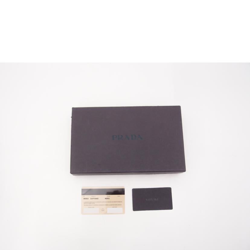 PRADA プラダ /サフィアーノ・ラウンドファスナー長財布/ブラック/M506A//Aランク/69