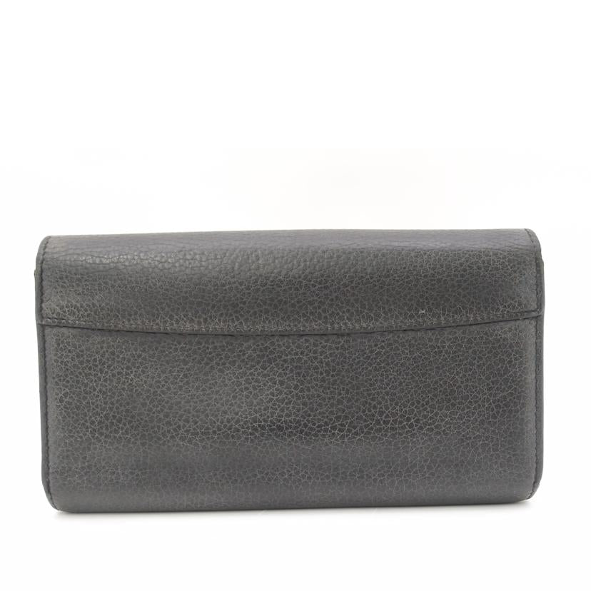 ＬＯＵＩＳ　ＶＵＩＴＴＯＮ ルイ・ヴィトン　二つ折り長財布　LVロゴ　スタッズ　レザー　黒　レディース　メンズ/ポルトフォイユ・カプシーヌ／トリヨン／ノワール・スタッズ/M63211//NZ4108/Bランク/69