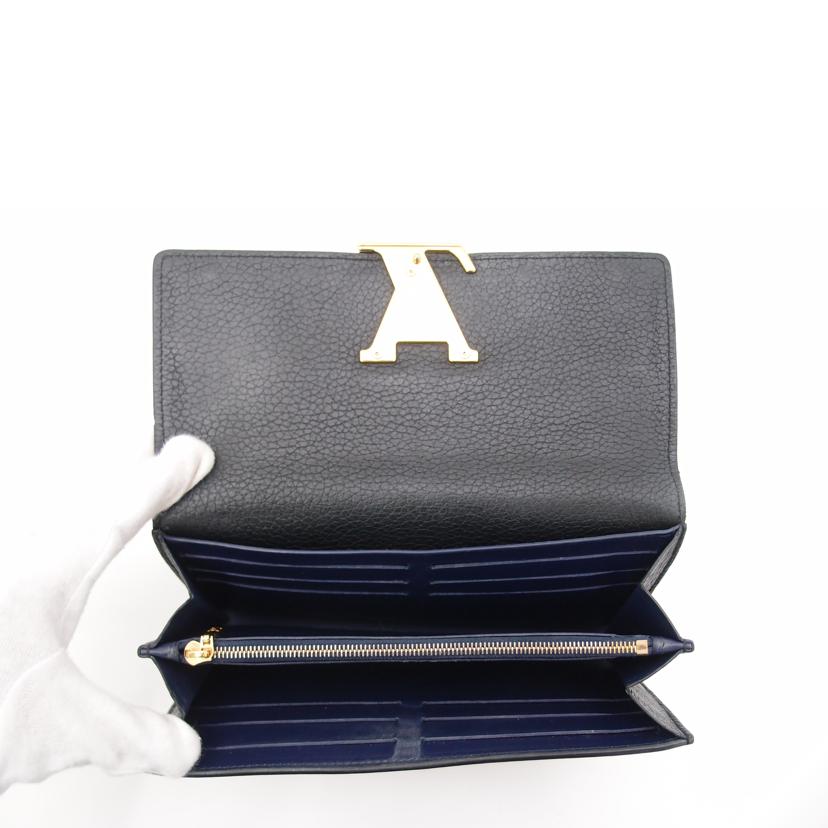 ＬＯＵＩＳ　ＶＵＩＴＴＯＮ ルイ・ヴィトン　二つ折り長財布　LVロゴ　スタッズ　レザー　黒　レディース　メンズ/ポルトフォイユ・カプシーヌ／トリヨン／ノワール・スタッズ/M63211//NZ4108/Bランク/69