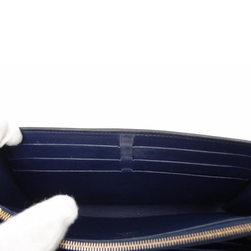 ＬＯＵＩＳ　ＶＵＩＴＴＯＮ ルイ・ヴィトン　二つ折り長財布　LVロゴ　スタッズ　レザー　黒　レディース　メンズ/ポルトフォイユ・カプシーヌ／トリヨン／ノワール・スタッズ/M63211//NZ4108/Bランク/69