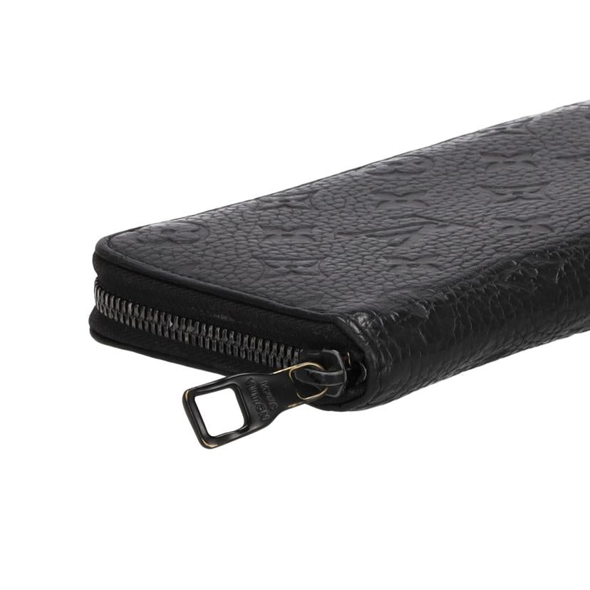 ＬＯＵＩＳ　ＶＵＩＴＴＯＮ ルイ・ヴィトン/ジッピーウオレットヴェルテイカル／トリヨン／ノワール/M69047//CA0***/Bランク/94
