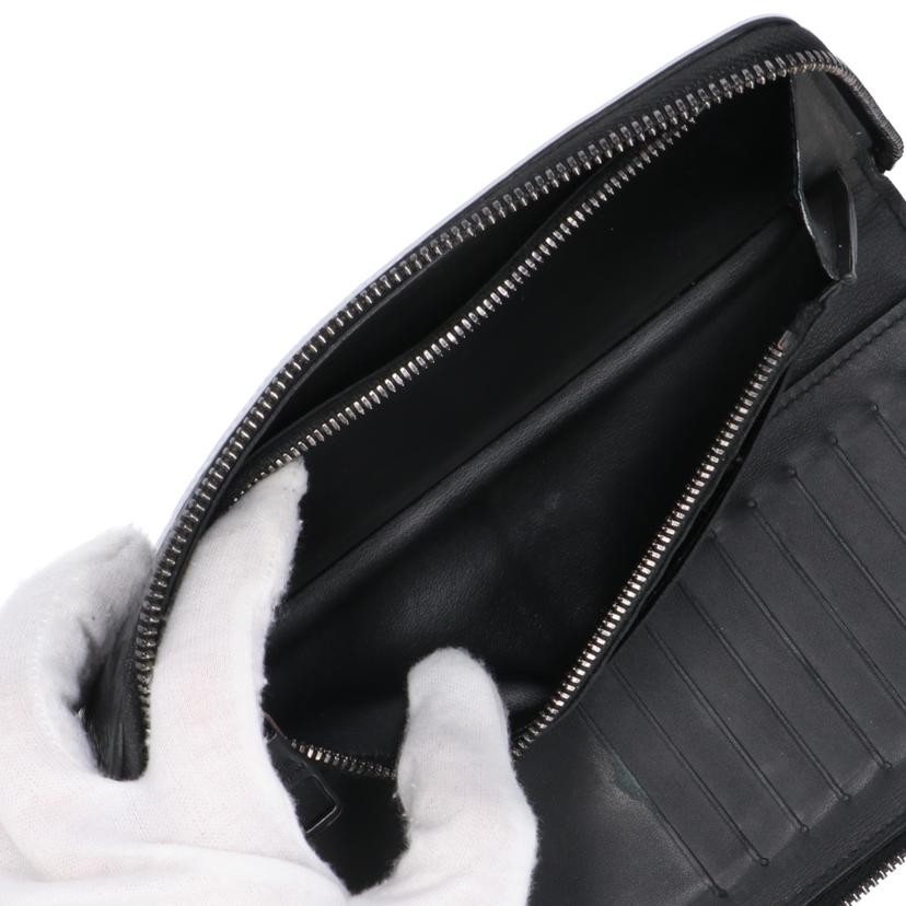 ＬＯＵＩＳ　ＶＵＩＴＴＯＮ ルイ・ヴィトン/ジッピーウオレットヴェルテイカル／トリヨン／ノワール/M69047//CA0***/Bランク/94